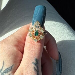 Elegant Gold and Green Gemstone Ring